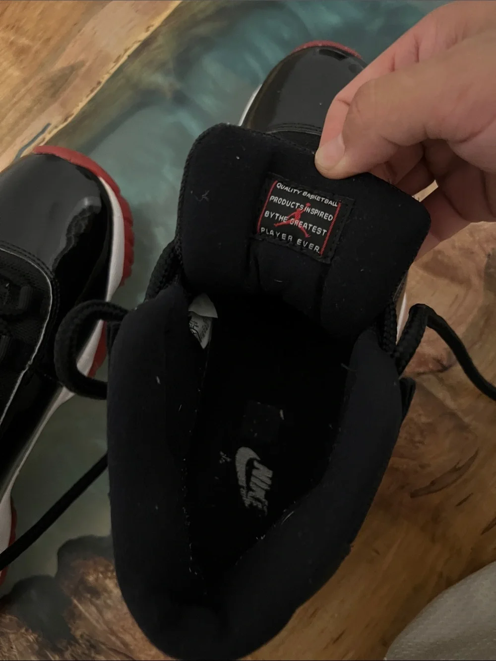 Jordan 11 Retro Playoff Bred Black and Red High-Top Sneakers